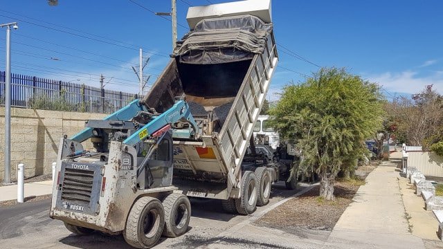 toyota skid steer and earth mover in perth street